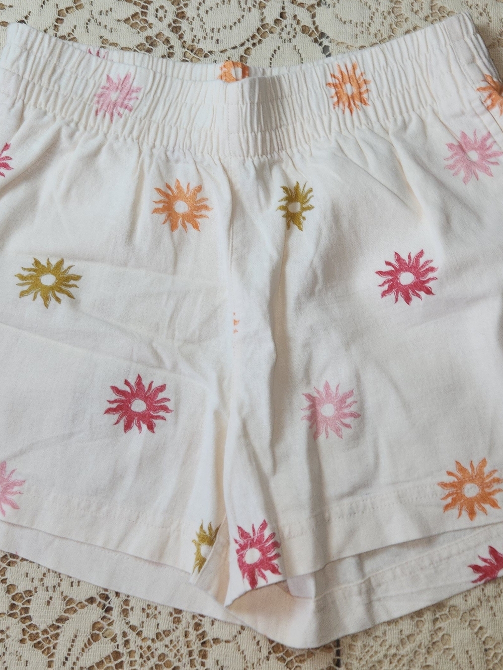 Old Navy White High-Waist Shorts with Pink, Orange & Olive Sunburst Print